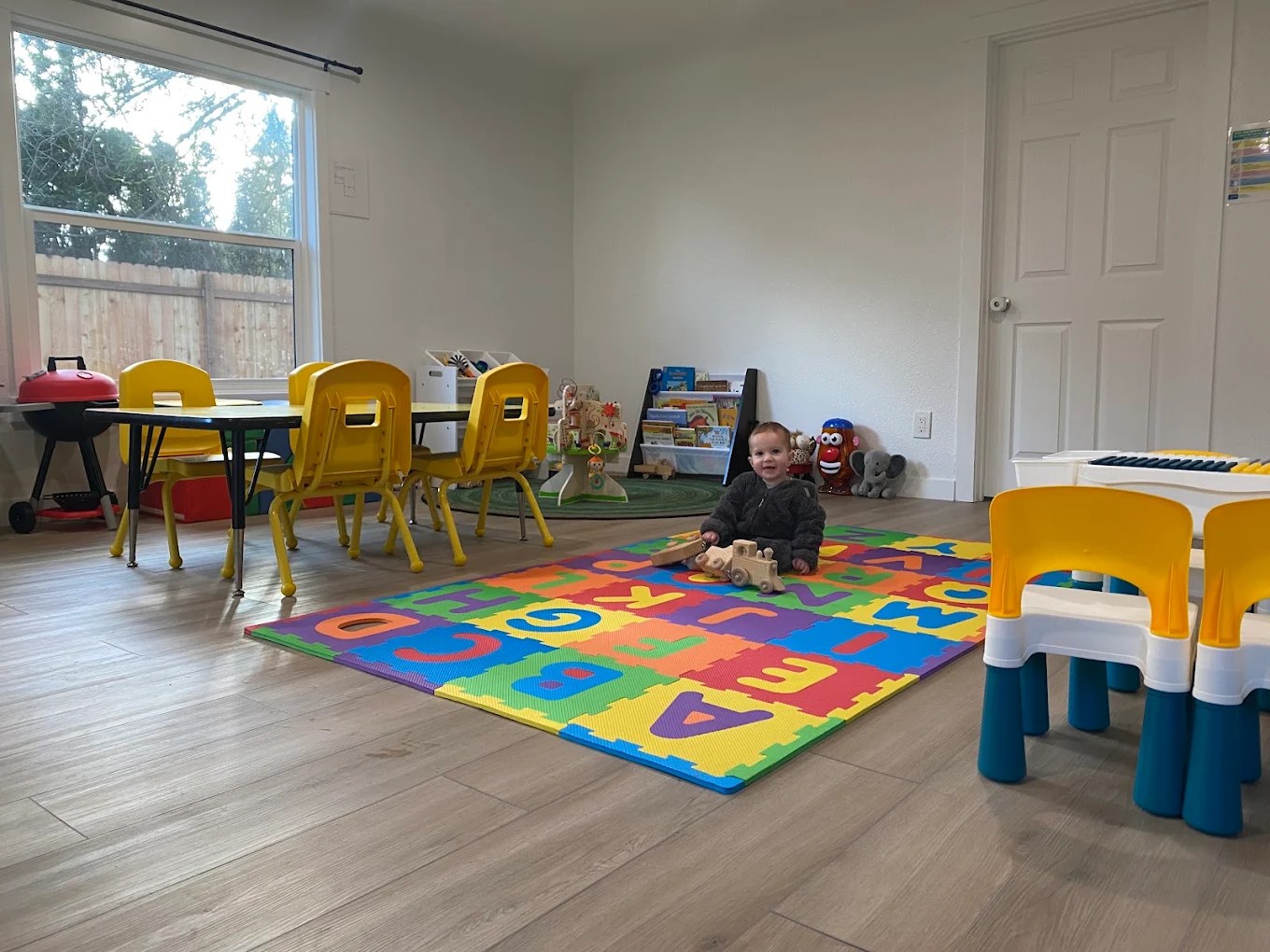 Happy child playing at Firefly Family Collective